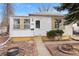 Charming single-story home featuring a well-maintained front yard with mature landscaping and a cozy entrance at 1994 Macon St, Aurora, CO 80010