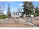 Inviting single Gathering home featuring a well-kept front yard and charming curb appeal at 1994 Macon St, Aurora, CO 80010