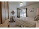 Charming bedroom with a window seat, chair, and neutral decor, creating a cozy and inviting retreat at 532 Kimmes Ln, Breckenridge, CO 80424