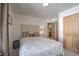 Bright bedroom with a patterned comforter, offering a cozy and stylish retreat with an ensuite bathroom at 532 Kimmes Ln, Breckenridge, CO 80424