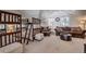 Large bonus room with bunk beds, lounge seating, and plenty of natural light at 532 Kimmes Ln, Breckenridge, CO 80424