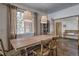 Warm dining room with a wooden table and a large window at 532 Kimmes Ln, Breckenridge, CO 80424