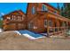 Beautiful wooden home with a covered porch, balcony and two-car garage at 532 Kimmes Ln, Breckenridge, CO 80424