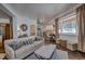Inviting living room with staircase, hardwood floors, and large window with view at 532 Kimmes Ln, Breckenridge, CO 80424