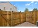 Backyard featuring a tall wooden fence for privacy and protection of the property at 6742 S Independence St, Littleton, CO 80128