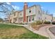 Charming multi-level townhome with landscaped front yard and inviting entrance at 6742 S Independence St, Littleton, CO 80128