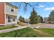 Well-maintained home with lush green lawn and mature trees in a friendly neighborhood at 6742 S Independence St, Littleton, CO 80128