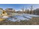 Community pool surrounded by a fence for safety and security at 6742 S Independence St, Littleton, CO 80128