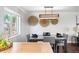 Elegant dining room with modern lighting fixture and decorative wall hangings at 11345 Marshall Ct, Westminster, CO 80020