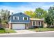 Charming two-story home with brick and siding exterior, featuring a well-maintained front yard and attached garage at 11345 Marshall Ct, Westminster, CO 80020