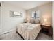 Cozy bedroom featuring a comfy bed, soft lighting, neutral colors, and modern decor at 42729 Ivydel Cir, Elizabeth, CO 80107