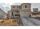 Charming two-story home with a covered porch and two-car garage at 42729 Ivydel Cir, Elizabeth, CO 80107