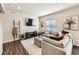 Cozy living room featuring a comfortable sofa and modern decor at 42729 Ivydel Cir, Elizabeth, CO 80107