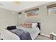 This bedroom features neutral tones and natural light at 3711 Mariposa St, Denver, CO 80211