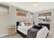 This bedroom features neutral tones and natural light at 3711 Mariposa St, Denver, CO 80211
