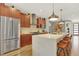 Bright, spacious kitchen with stainless steel appliances and a large center island at 3711 Mariposa St, Denver, CO 80211
