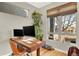 Comfortable home office with natural light and modern desk setup at 3711 Mariposa St, Denver, CO 80211