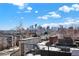 Rooftop with comfortable seating and a stunning city skyline view at 3711 Mariposa St, Denver, CO 80211