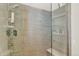 Walk-in shower features glass enclosure and decorative tile surround at 3711 Mariposa St, Denver, CO 80211