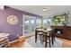 Cozy dining area with backyard access, mountain views, and lots of natural light at 8544 S Upham Way, Littleton, CO 80128