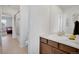 Hall bathroom with vanity and shower-over-tub combo at 87 Green Fee Cir, Castle Pines, CO 80108