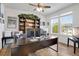 Bright office with dark wood floors, a ceiling fan, and windows that offer plenty of natural light at 87 Green Fee Cir, Castle Pines, CO 80108