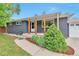 Charming single-story home with a covered porch, walkway, and newly landscaped front yard at 2598 Teller St, Lakewood, CO 80214