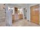 Bathroom with double vanity, walk-in shower, and a separate toilet room at 29433 Firethorne Ct, Evergreen, CO 80439