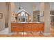 Open-concept design with breakfast bar connects the kitchen to the living spaces creating an inclusive and social atmosphere at 29433 Firethorne Ct, Evergreen, CO 80439