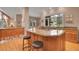 Gourmet kitchen with center island, modern appliances, and ample counter space perfect for cooking and entertaining at 29433 Firethorne Ct, Evergreen, CO 80439