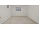 Large basement with concrete floor and window at 4465 E 121St Pl, Thornton, CO 80241