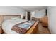 Bedroom featuring a wooden bed and matching dressers, creating a cozy and organized space at 4465 E 121St Pl, Thornton, CO 80241