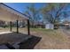 Large backyard featuring a shed, covered patio, and plenty of space for outdoor activities and relaxation at 1675 N Wabash St, Denver, CO 80220