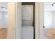Laundry area featuring a stacked washer and dryer inside a closet at 1675 N Wabash St, Denver, CO 80220