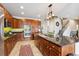 Gourmet kitchen equipped with granite countertops, stainless steel appliances, and ample storage space at 24714 E Quarto Pl, Aurora, CO 80016