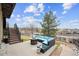 Outdoor patio with conversation furniture and a fire pit to enjoy the neighborhood views at 24714 E Quarto Pl, Aurora, CO 80016