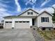 Charming single-Gathering home featuring a three-car garage, complemented by a beautifully maintained front yard at 229 Wooten Ave, Brighton, CO 80601