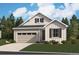 Charming single-Gathering home featuring a garage, tidy lawn, and stylish architectural details at 229 Wooten Ave, Brighton, CO 80601