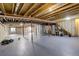 Spacious unfinished basement with ample room for storage and future customization at 4270 Defoe St, Strasburg, CO 80136