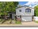 Charming two-story home with a brick and siding exterior, plus a two car garage and front yard at 5831 W 108Th Pl, Westminster, CO 80020