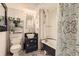 Stylish bathroom featuring a vintage clawfoot tub, patterned tile floors, and modern fixtures at 1376 N Pearl St # B1, Denver, CO 80203