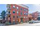 Apartment building featuring brick facade, classic architecture, and ample street parking at 1376 N Pearl St # B1, Denver, CO 80203
