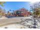 A wide-angle view of the apartment building situated on a city street near the intersection at 1376 N Pearl St # B1, Denver, CO 80203