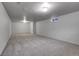 View of the basement with new carpet and freshly painted walls at 375 Kohl St, Broomfield, CO 80020