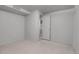 Finished basement area with tile floor and painted walls at 375 Kohl St, Broomfield, CO 80020