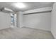 Finished basement area with carpet and painted walls at 375 Kohl St, Broomfield, CO 80020