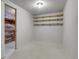 Basement area with exposed shelving at 375 Kohl St, Broomfield, CO 80020