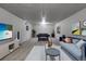 Finished basement with a pool table and comfortable living space at 375 Kohl St, Broomfield, CO 80020
