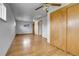 Bedroom featuring hardwood floors, a ceiling fan, and a closet at 375 Kohl St, Broomfield, CO 80020