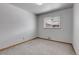 Bedroom with carpet, window and neutral decor at 375 Kohl St, Broomfield, CO 80020
